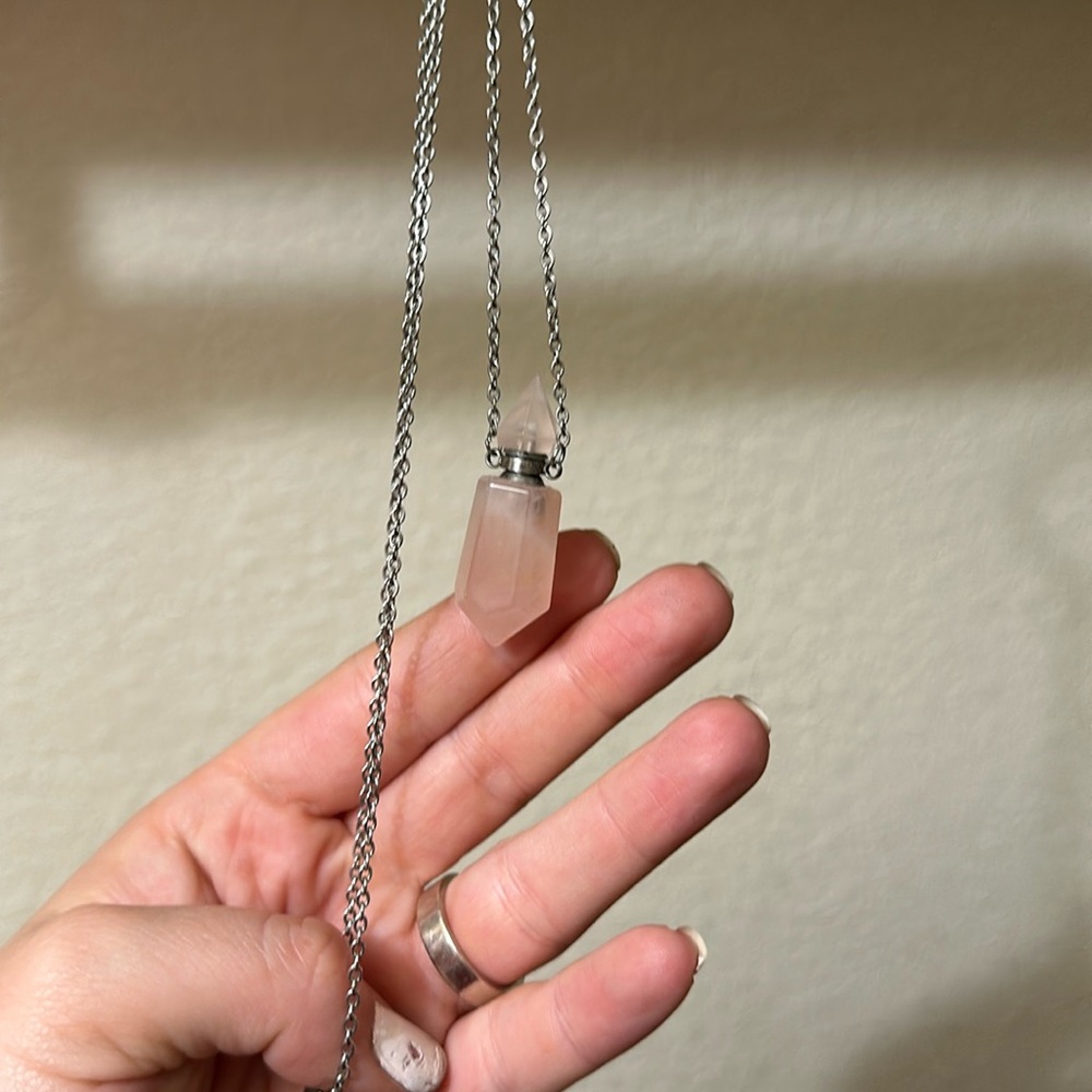 Rose quartz necklace with refillable area